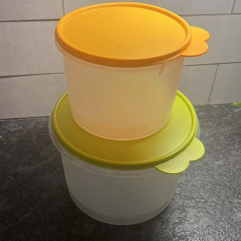 Brand new never used Round Tupperware containers with tight fitting lids